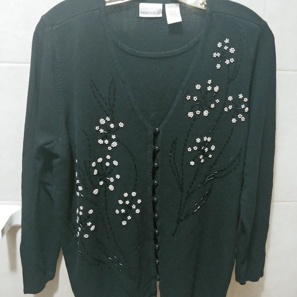Black blouse with pearl flower design